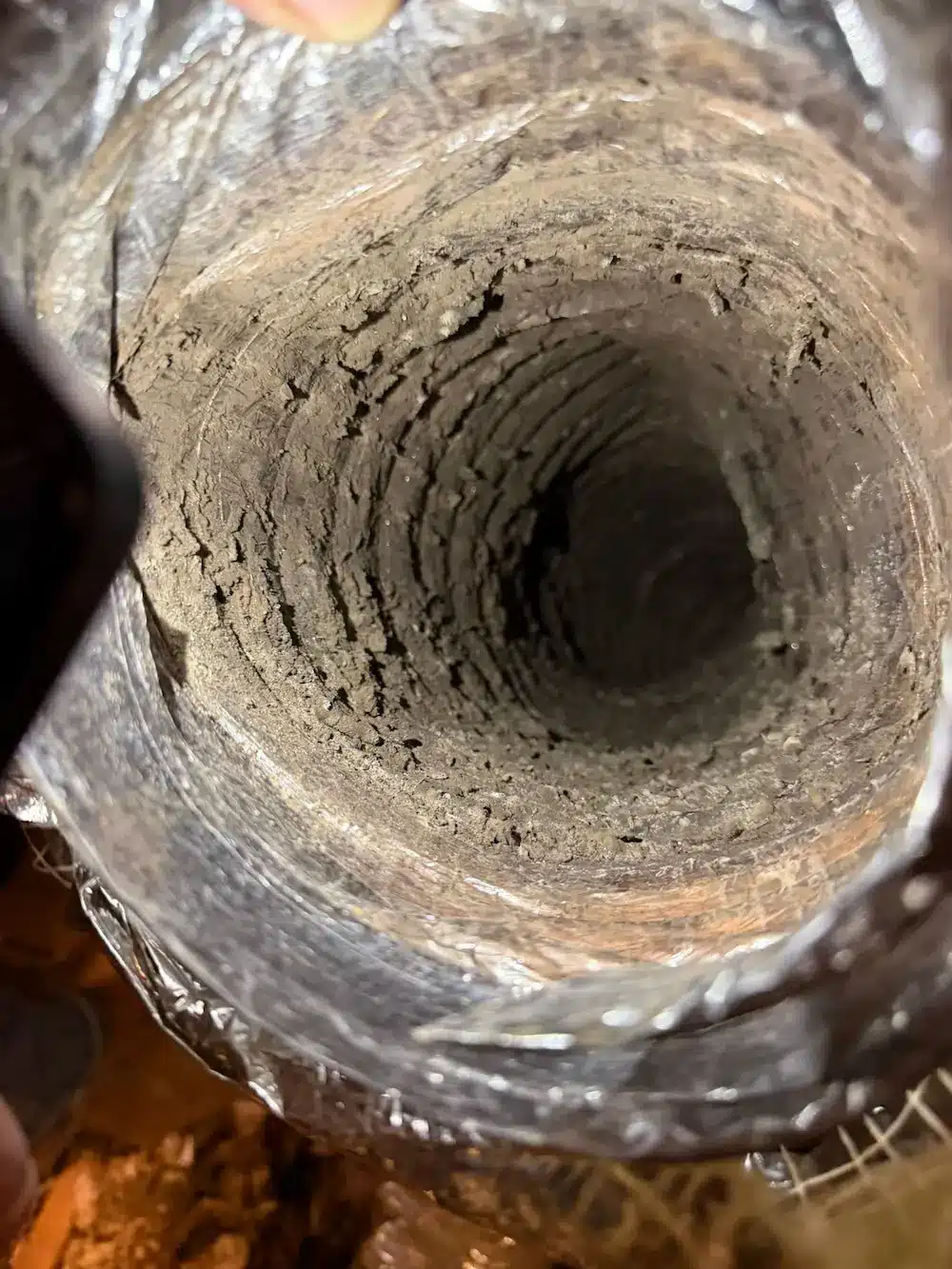Dirty duct interior showing buildup