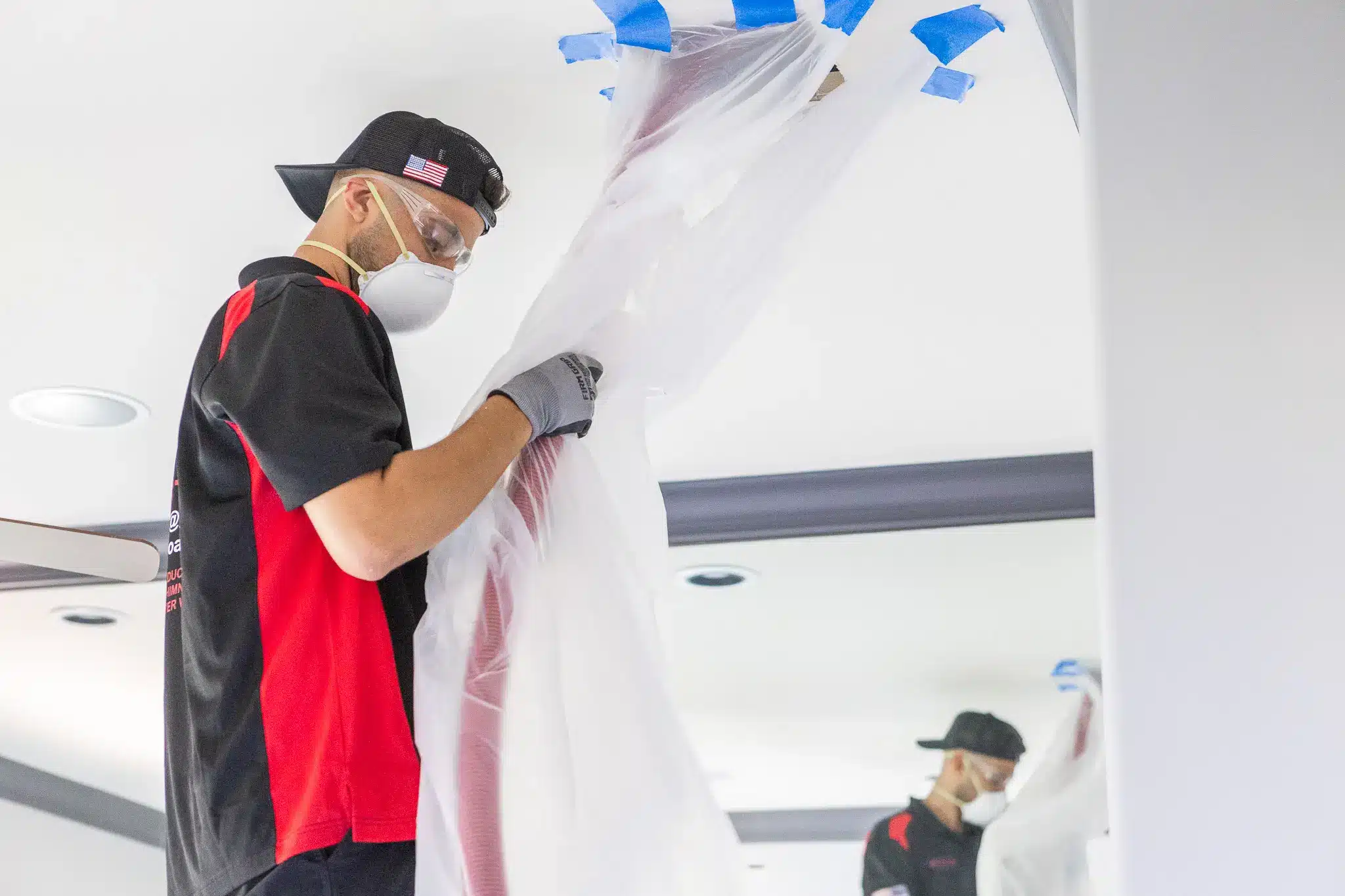 Go Air Ducts technician preparing duct for cleaning