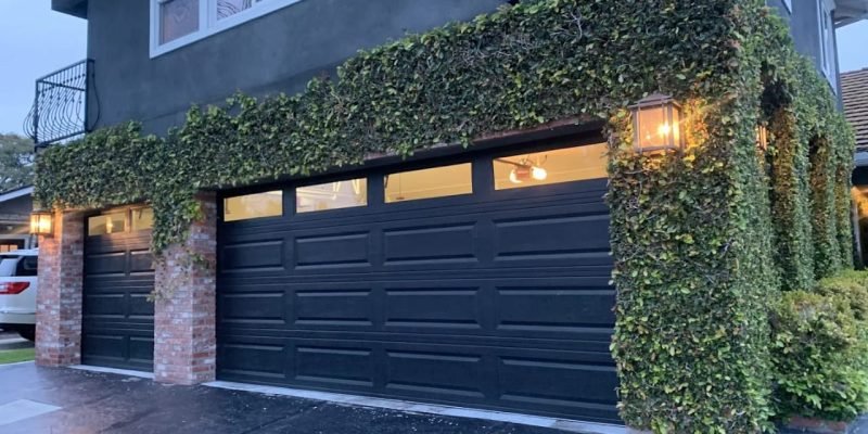 Modern Black Double Garage Doors With Brick Trim Somerville NJ